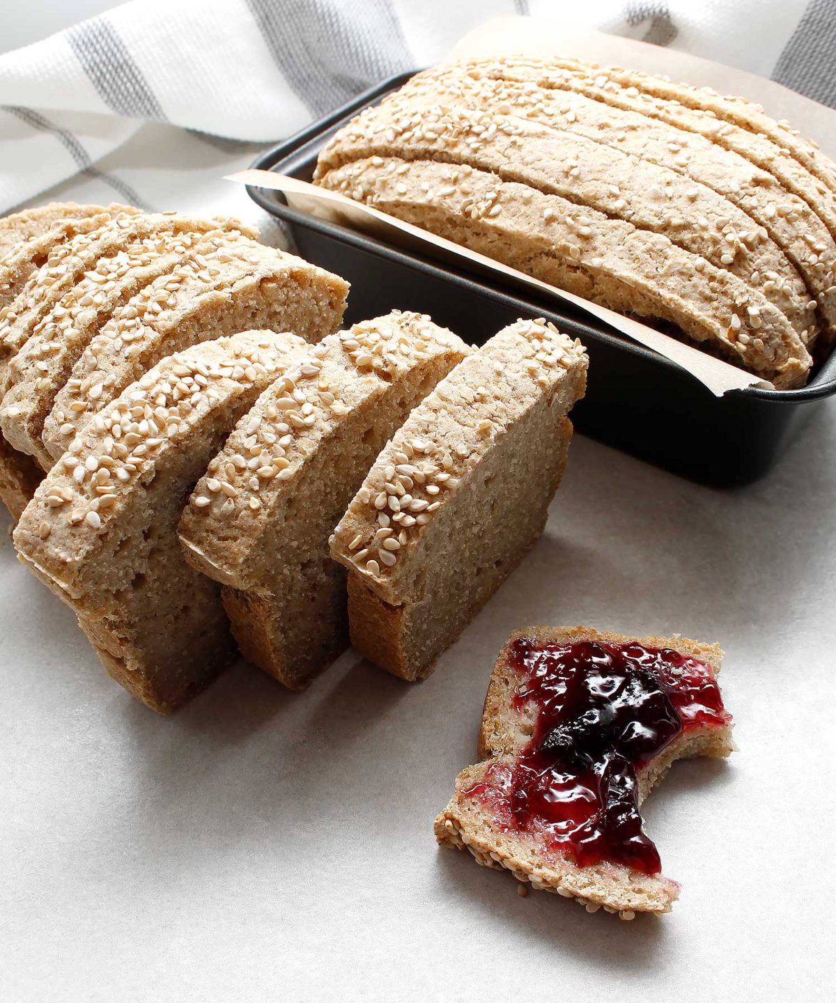 Slice of yeast-free, gluten-free and vegan bread with jam.