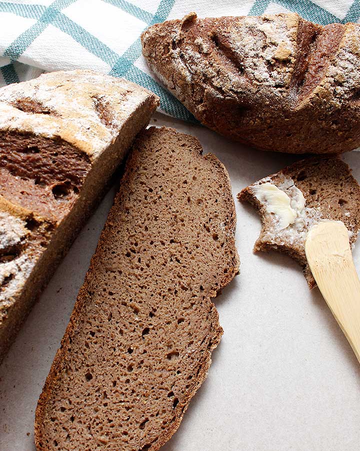 A slice of yeast-free grain-free bread with buttery spread