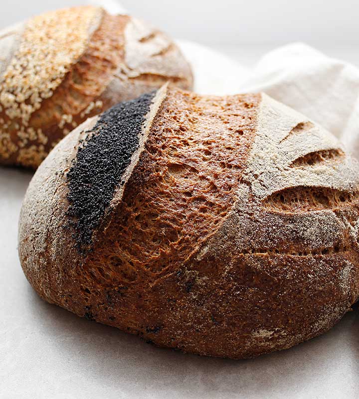 A sourdough loaf prepared with a sorghum sourdough starter (wild yeast). This gluten-free, egg-free and dairy-free bread recipe is also rice-free, vegan and completely allergen-friendly.