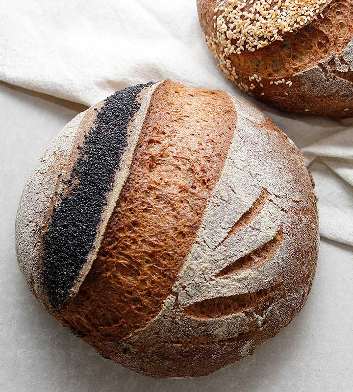 A sourdough loaf prepared with a sorghum sourdough starter (wild yeast). This gluten-free, egg-free and dairy-free bread recipe is also rice-free, vegan and completely allergen-friendly.