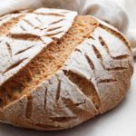 A beautiful crusty artisan-style, free-form, gluten-free and vegan Buckwheat Sourdough Loaf. Allergen-Friendly. freshisreal.com
