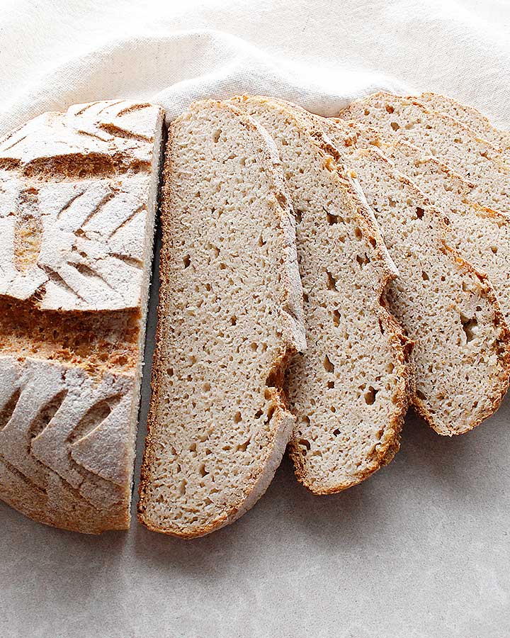 A beautiful crusty artisan-style, free-form, gluten-free and vegan Buckwheat Sourdough Loaf. Allergen-Friendly. freshisreal.com