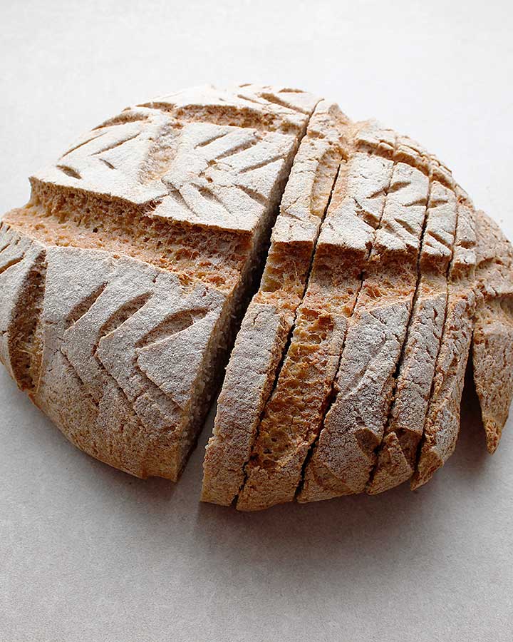 A beautiful crusty artisan-style, free-form, gluten-free and vegan Buckwheat Sourdough Loaf. Allergen-Friendly. freshisreal.com