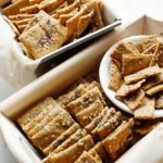 Homemade seed crackers in two small baskets.