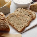 Simple 4-ingredient BBQ baked and sliced gluten-free sourdough loaf.