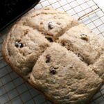 Beautiful Irish soda bread without gluten, eggs or dairy made in a bread machine.